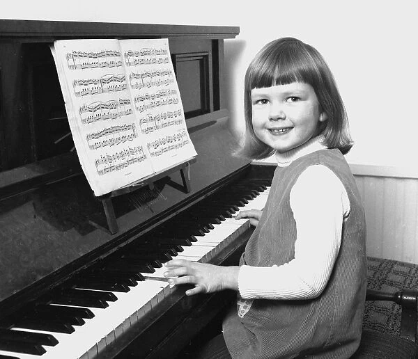 Little girl playing the Piano