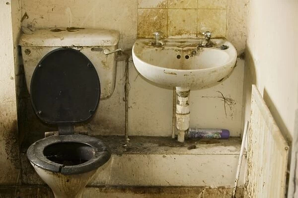 A disgustingly dirty bathroom in an abandoned council house in Carlisle Cumbria UK