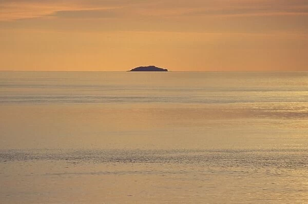 Grassholm Island at sunset, Pembrokeshire, Wales, UK, Europe (rr)
