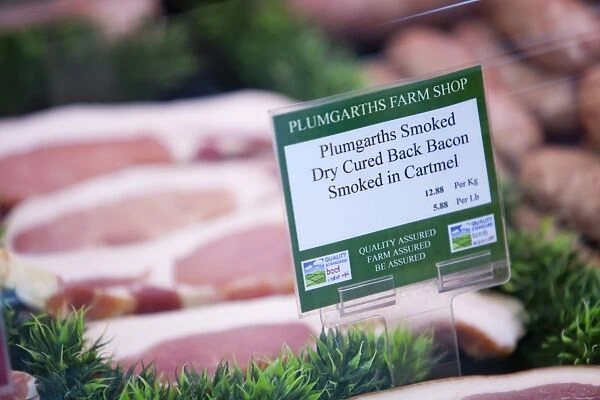 Locally produced and smoked bacon at Plumgarths farm shop in Kendal, Cumbria, UK. Farm shops are a great way for farmers to diversify and help to cut down hugely on food