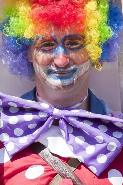 A man dressed up as a clown, Ilfracome, UK