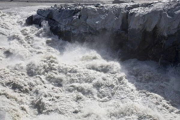 Meltwater from the Russell Galcier that drains the Greenland Ice Sheet 26 km inland from Kangerlussuaq. Like most Greenland glaciers it is both receeding and speeding up as a result of global warming and the rivers that drain them are becoming more