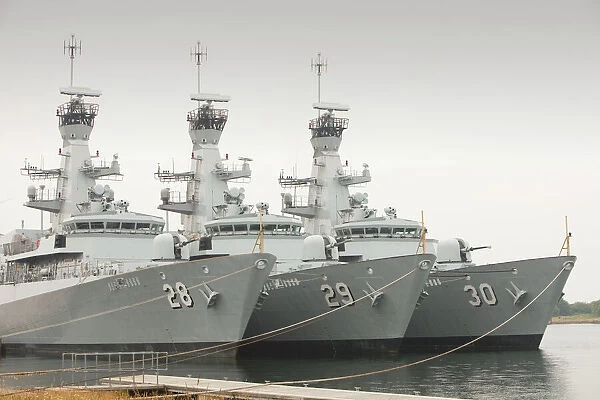 Naval warships moored in Barrow Dock for refitting. It would make sense for the world to reign back its spending on arms and spend some of this income on combatting climate
