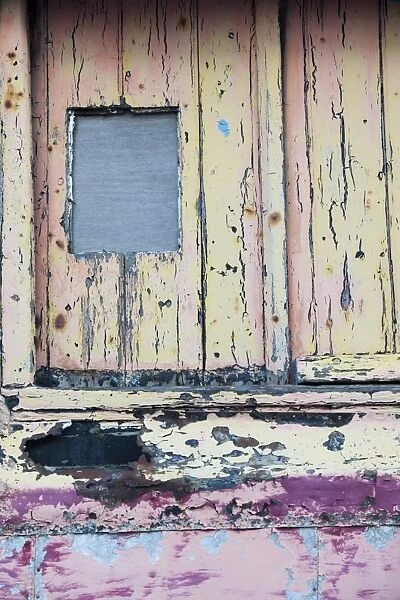 Paint peeling on a door in St Just, cornwall, UK