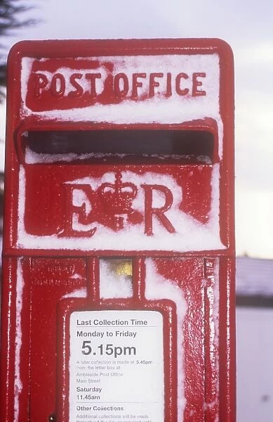 Snow on a postbox in Keswick, Cumbria, UK