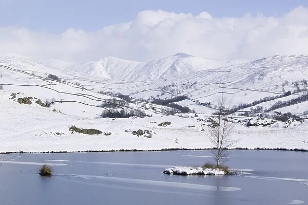 Snowfall over the Lake District Kentmere fells UK