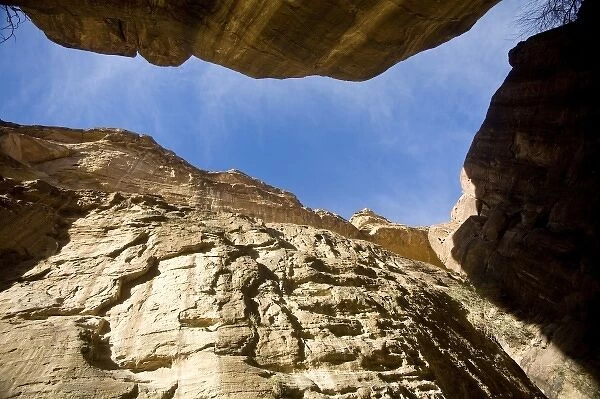 Jordan, Petra. Narrow walls of 1, 600-foot-tall gorge or Siq (Arabic) that is the