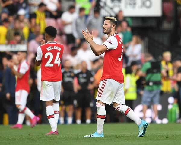 Arsenal's Sead Kolasinac Celebrates with Fans after Watford Victory