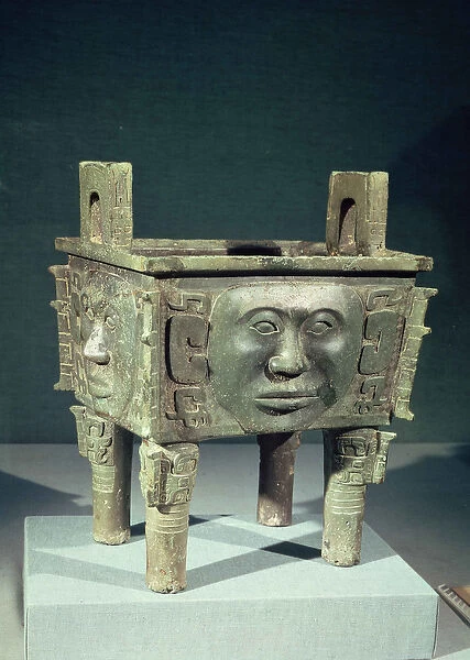 Rectangular ting vessel with human faces, from Ning-hsiang, Hunan Province