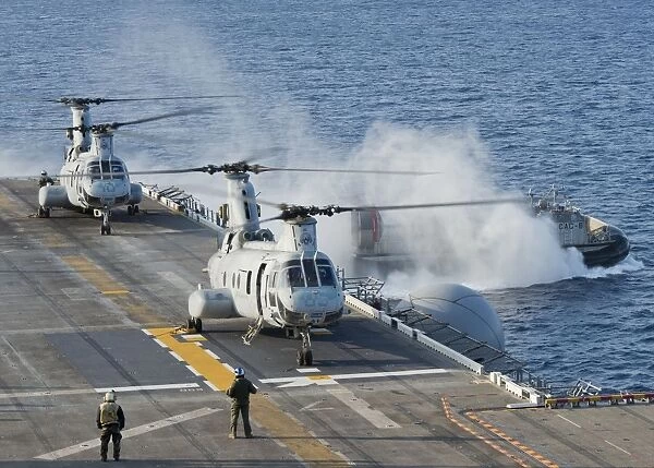 Two CH-46E Sea Knight helicopters on the flight deck of USS Bonhomme Richard