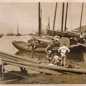 Japanese dockside scene - with young bathers