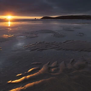 Beautiful sunset light over the beach at Constantine Bay in North Cornwall, England