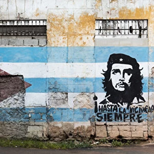 Painting of Che Guevara and Cuban flag on a wall, Havana, Cuba, West Indies, Caribbean