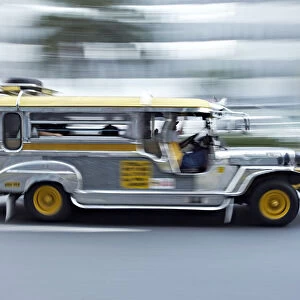 Asia, South East Asia, Philippines, Manila, a jeepney speeding through Makati