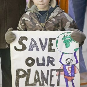 A child Protestor at the I Count climate change rally in London