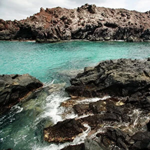 Volcanic rock shoreline on Ascension Island in the south Atlantic Ocean