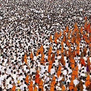 Over 100, 000 Buddhist monks and novices gather to receive alms at Wat Phra Dhammakaya