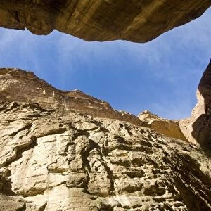 Jordan, Petra. Narrow walls of 1, 600-foot-tall gorge or Siq (Arabic) that is the