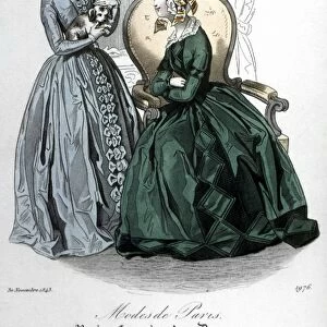 WOMENs FASHION, 1843. Two women wearing redingote dresses. French color fashion plate from Petit Courrier des Dames, 1843