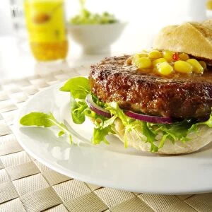 Beef burgers, hamburgers, in rolls with lettuce and garnish