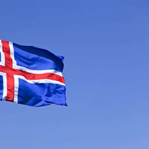 Icelandic national flag blowing in the wind, Iceland, Europe