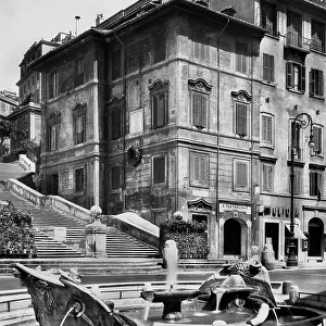 Piazza di Spagna in Rome with the Barcaccia Fountain in the foreground and the Spanish Steps or the Stairway to the Trinit dei Monti in the background
