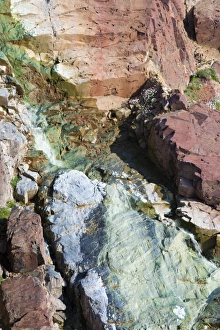 Sea Cliffs stained green from copper deposits leaching from the old Geevor Tin Mine near St Just in Cornwall Sea Cliffs stained green from copper deposits leaching from the old Geevor Tin Mine near St Just in Cornwall