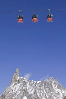 The Vallee Blanche telecabine above the Dent Du Geant Chamonix France The Vallee Blanche telecabine above the Dent Du Geant Chamonix France